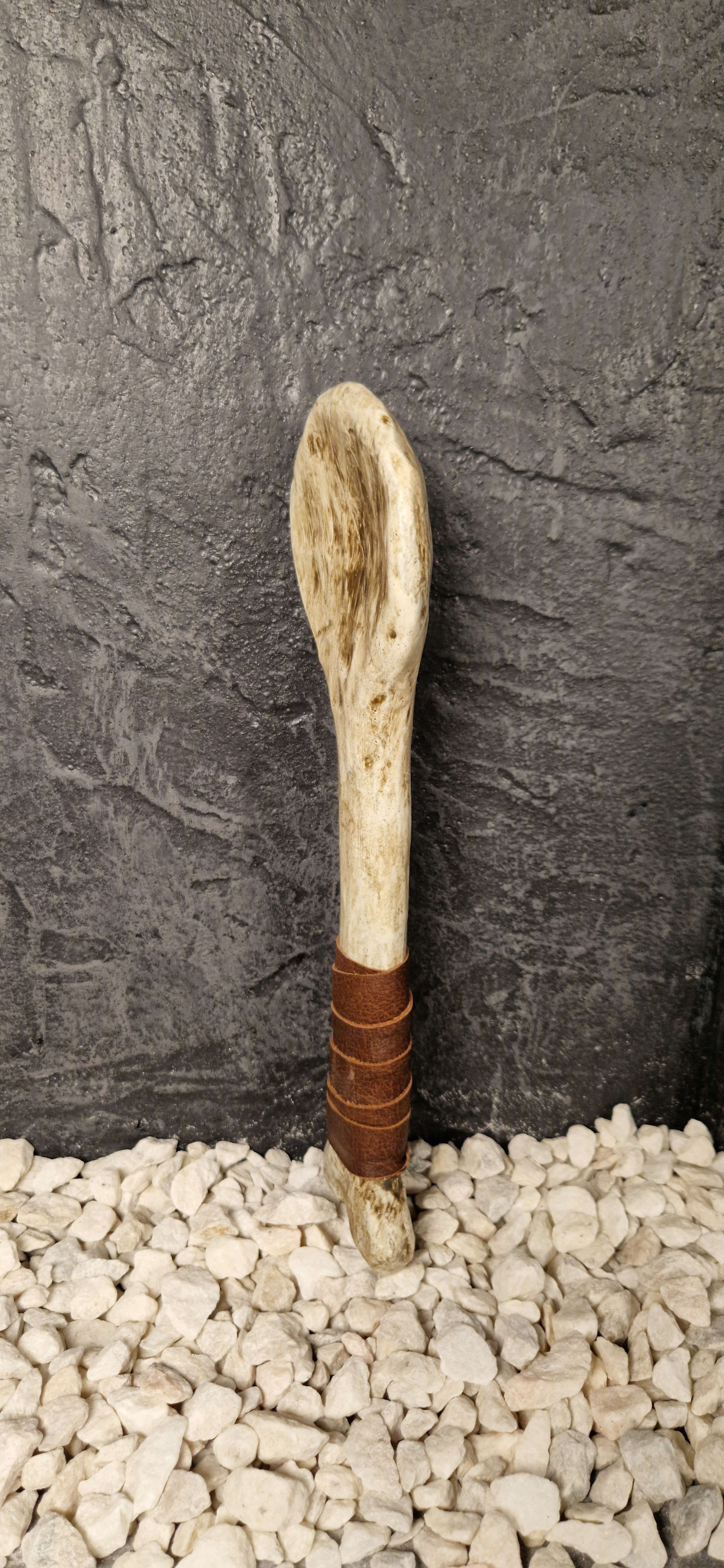 Bone spoon, half dark brown
